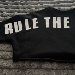 Black Cropped Sweatshirt with Bold White Text on Back